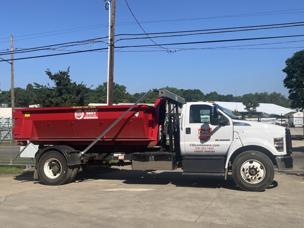 A 10 yard dumpster on a truck