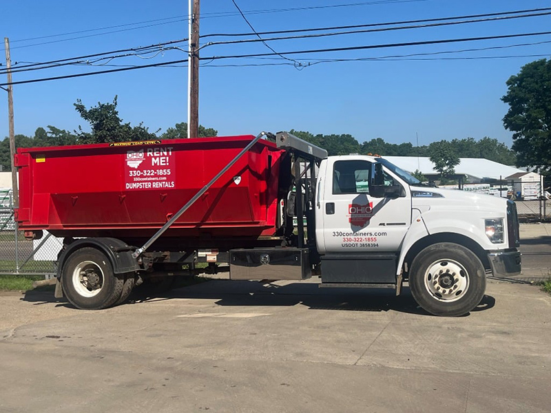 A 15 yard dumpster on a truck
